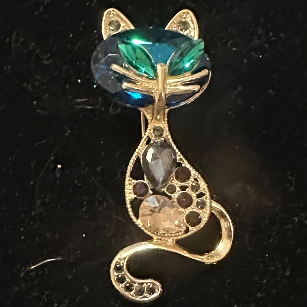Elegant Gold Cat Brooch with Blue and Green Accents